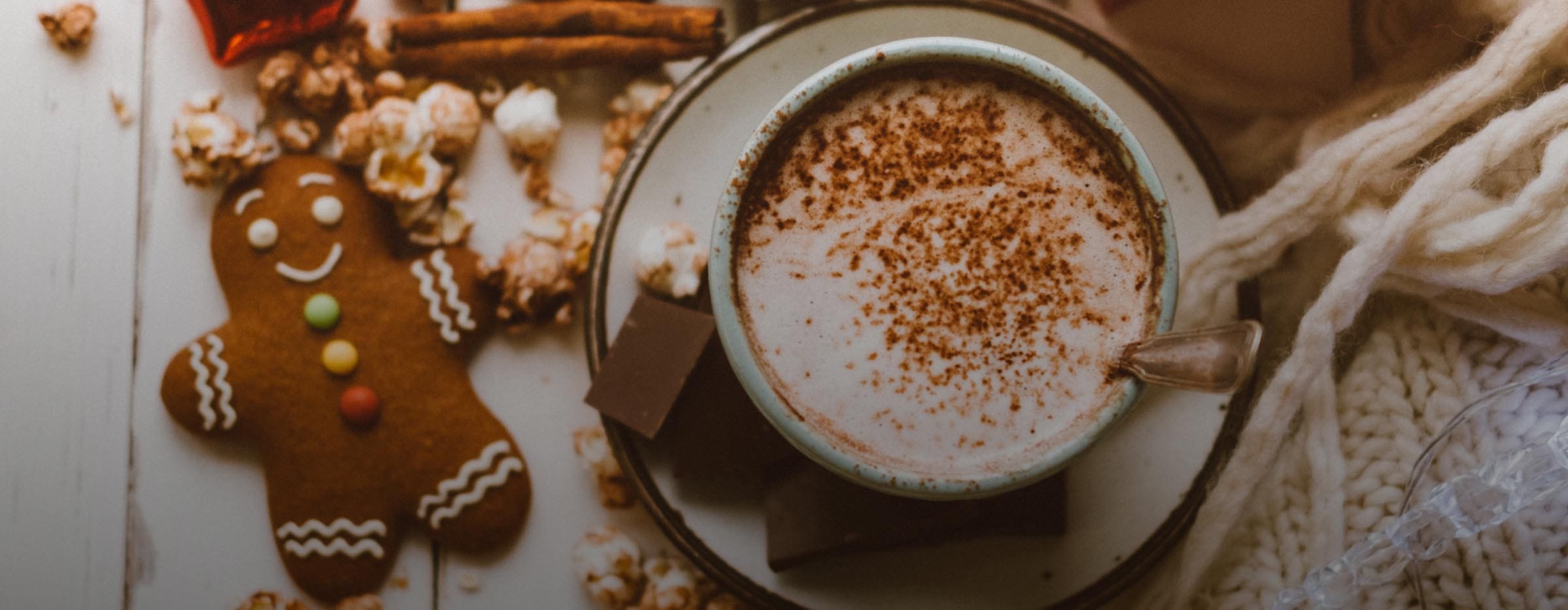 Cup of coffee and a gingerbread cookie