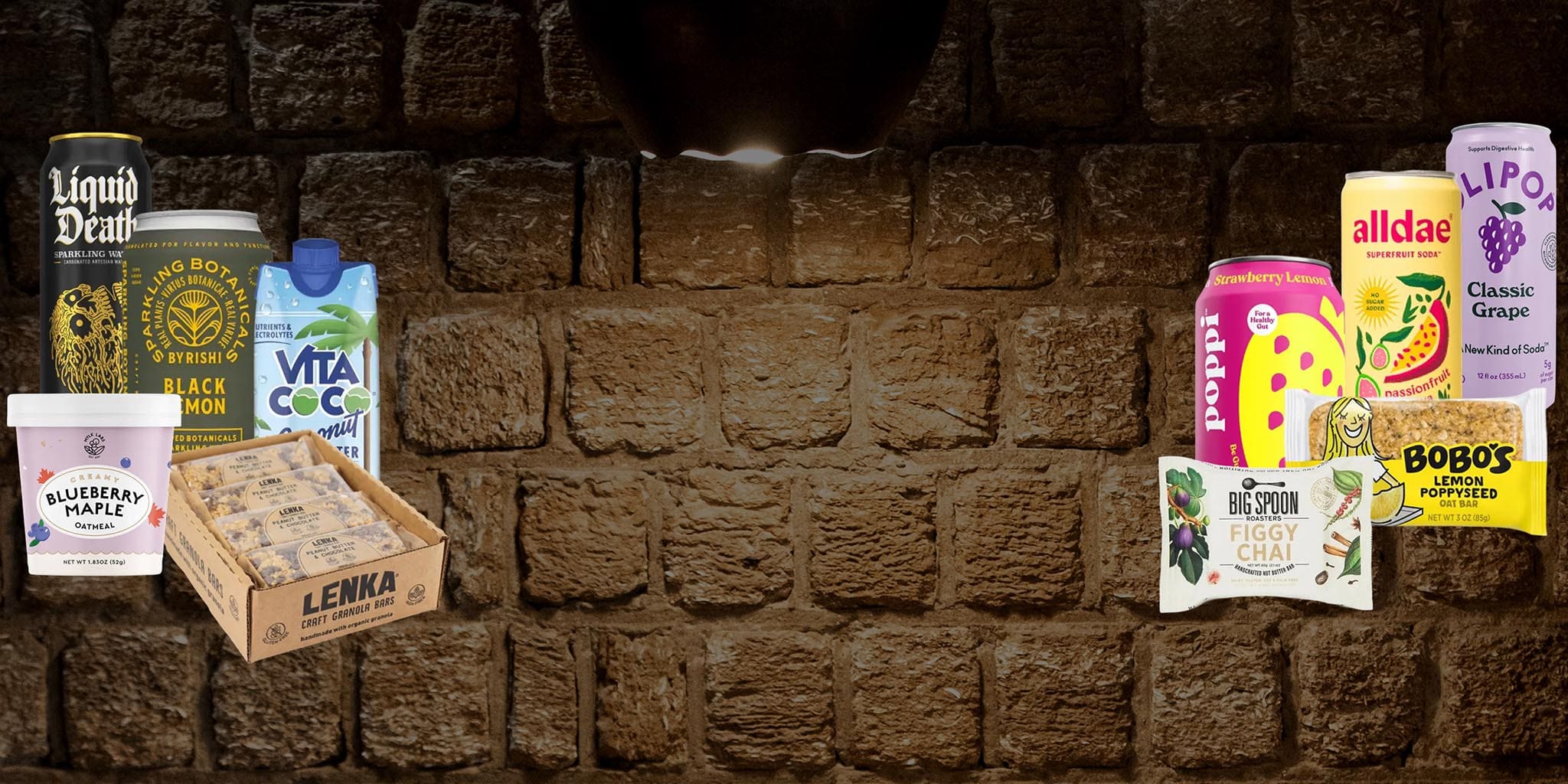 Assorted health and wellness products displayed against a brick wall.