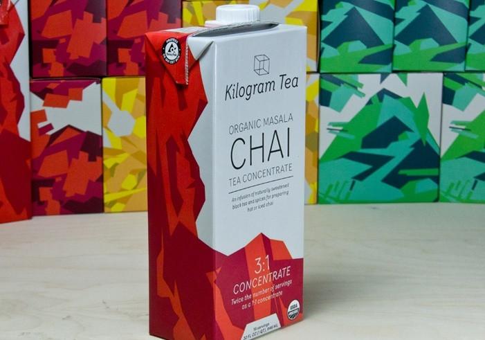 side view of a single carton of kilogram organic masal chai tea concentrate